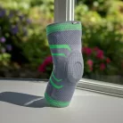 Genumax rugalmas térdrögzítő szilikon patella gyűrűvel és merevítő betétekkel